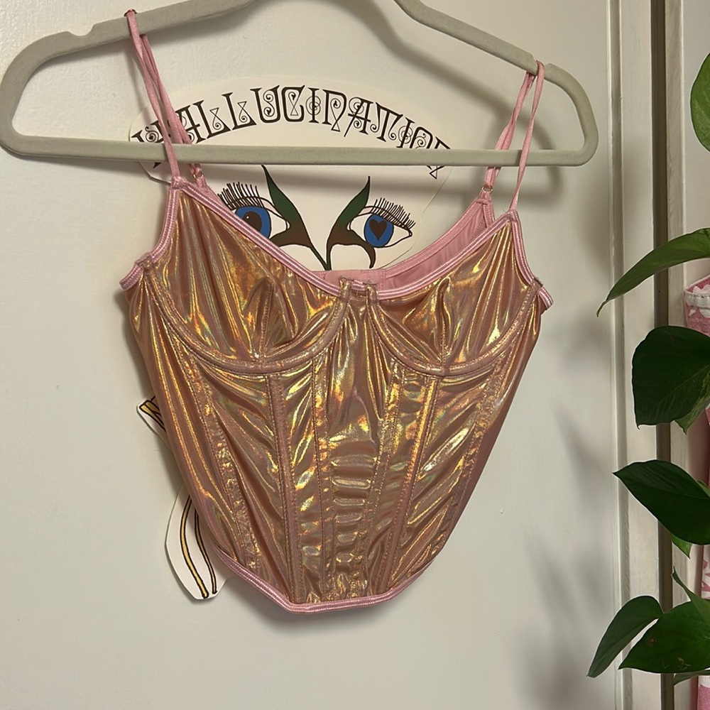 Out from under iridescent corset top